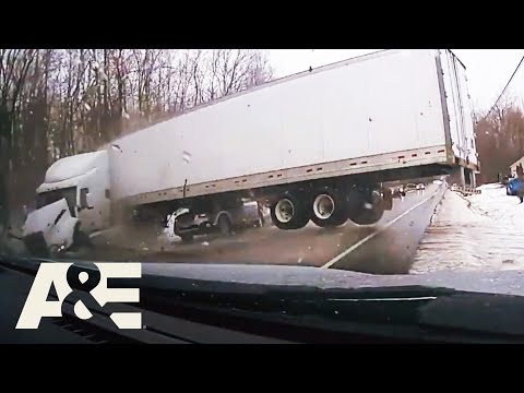 Semi-Truck Jackknifes into Two Cars On Icy Road | Road Wars | A&E
