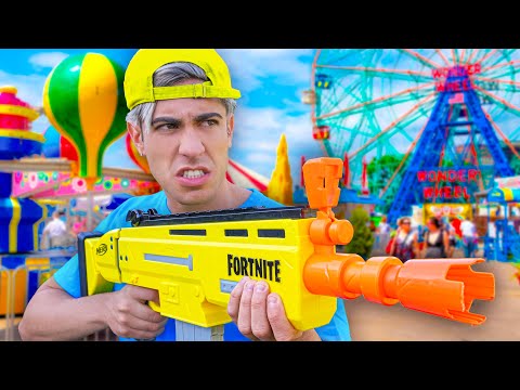 NERF BATTLE IN AN AMUSEMENT PARK !!