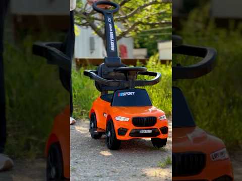 Детская каталка-толокар BMW X5 M 4848 с родительской ручкой 2 в 1 красный - фото 1 - id-p2002157749