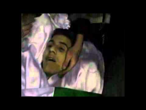 جثماني طارق الأسود وأنس الطرشة في حي الملعب البلدي في مدينة حمص