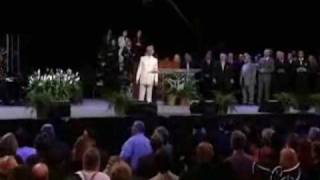 Benny Hinn sings "BECAUSE HE LIVES"