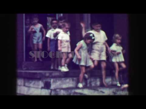 1949: School children leaving class down steep concrete staircase, no handrail. PHOENIX, ARIZONA