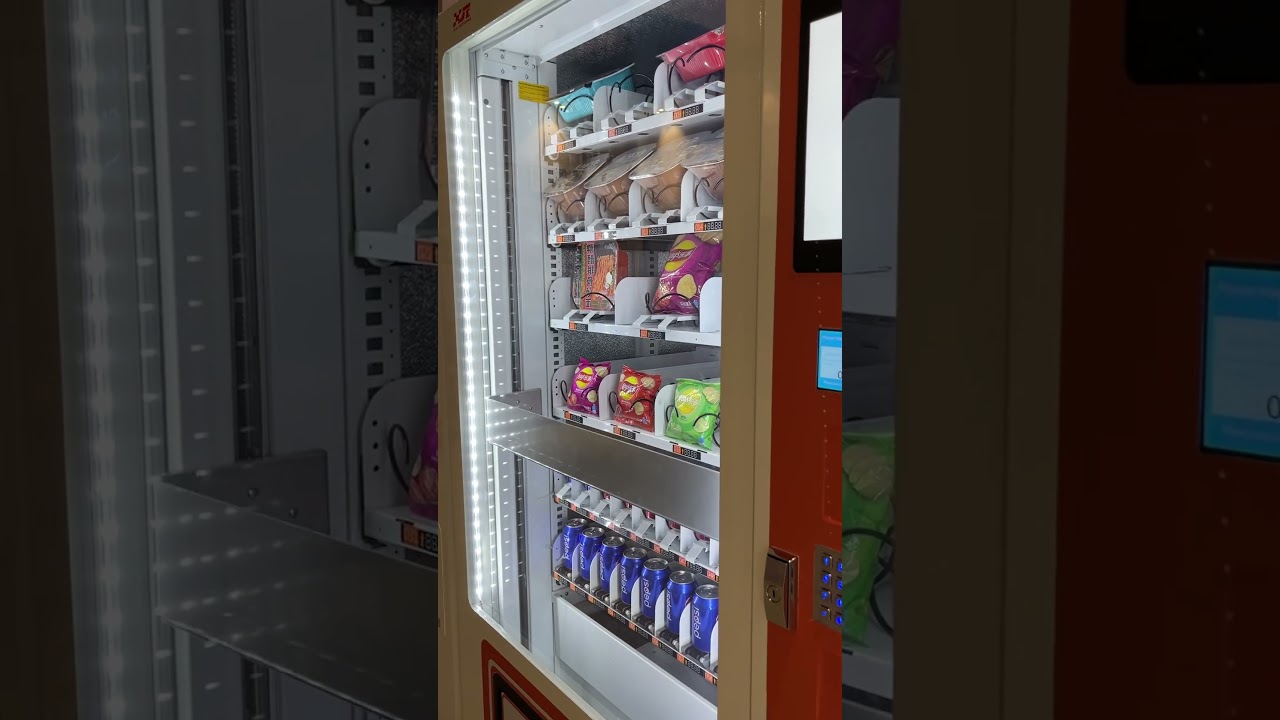 Small touch screen ad screen vending machine with elevator for drinks and snacks