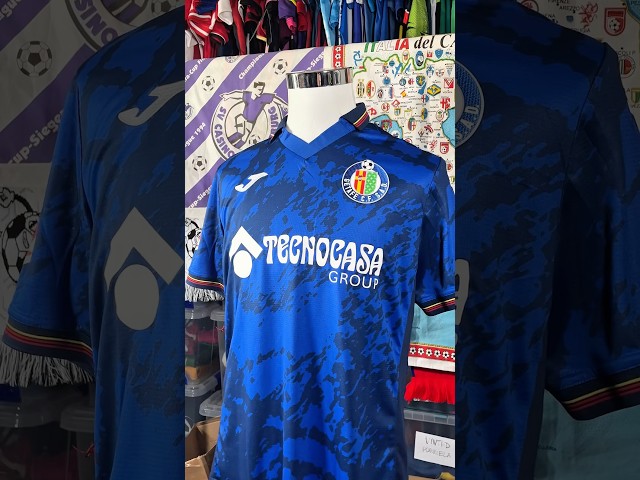 Vídeo relacionado con Getafe CF | Camiseta de Manga Corta Negra Unisex-Adultos Pequeño