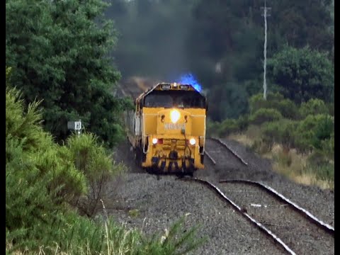 A Fiery XR Diesel Locomotive hauling a late Running Grain Train.