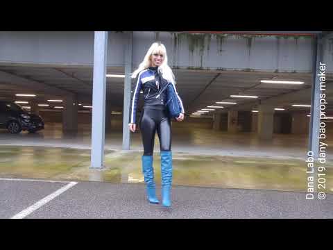 DANA LABO the woman in black , catwalk in blue boots, vinyl leggings and leather jacket