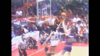 Julius Erving Sneaks a Dunk Past Bill Laimbeer