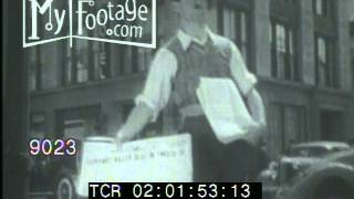 Stock Footage - 1940s NEWSBOY ON CORNER - EXTRA EXTRA READ ALL ABOUT IT!