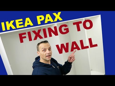 Part of a video titled Ikea Pax wardrobes (fixing to wall) - YouTube