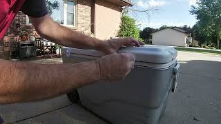 Colman Cooler. Installing new hinges.