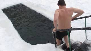 AMERICANS are trying to swim in ice cold water in RUSSIA