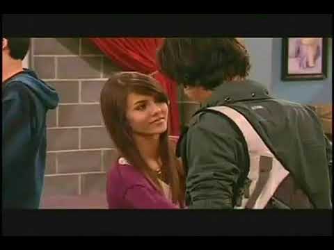 Victorious 2010–2013 Nickelodeon series trailer frame: Tori Vega on the Hollywood Arts stage under spotlights