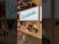 Vespa Scooter Marketing Stand At EICMA In Milano Italy