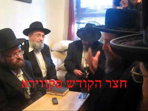 Skver Boro Park Rebbe comforting the father of Leiby Kletzky