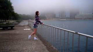 girl walking away into fog  Beautiful