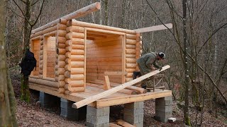 Download the video "Step by Step: Building a Cozy 2-Story Wooden House in Nature’s Heart"