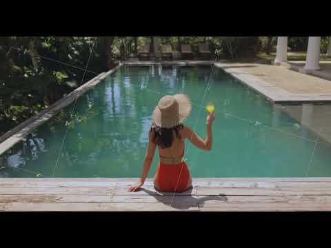 Woman in a Bodysuit and Straw Hat at the Pool During Summer Holidays