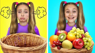 Sasha cooking fruits, popcorn, vegetables in a toy kids cafe