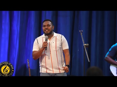 Pauna Kule singing “Presence Bilong Yu Emi Swit Moa Yet”