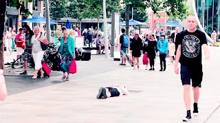 LYING ON THE FLOOR IN PUBLIC