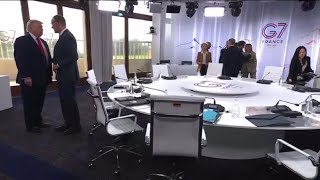 G7 di Evian, Merz dona la maglia della nazionale di calcio tedesca a Trump durante il vertice sul...