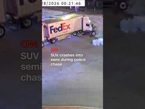 SUV crashes into semi during police chase