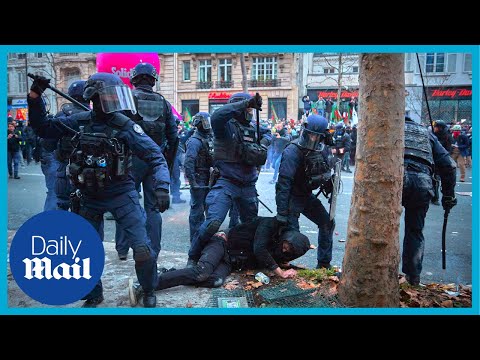 France protests: French riot police attack protesters with batons amid pension reform announcement