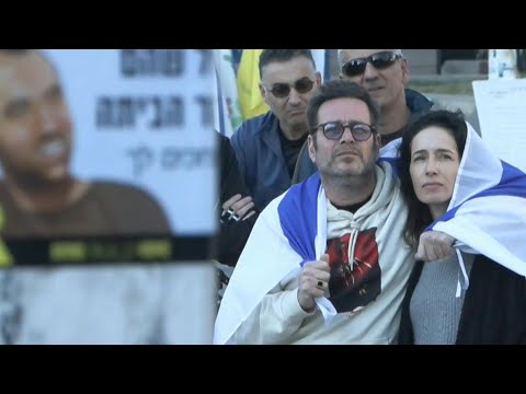 People react in Hostage's Square as Ofer Kalderon and Yarden Bibas released | AFP