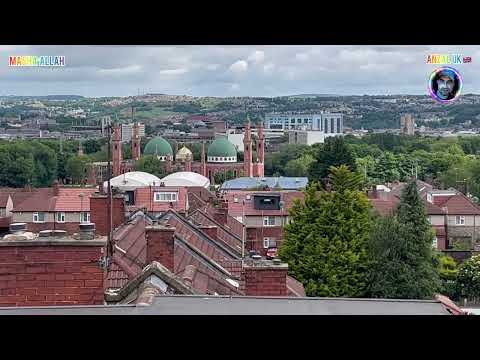 Men on the Roof Top edge . View of Bradford