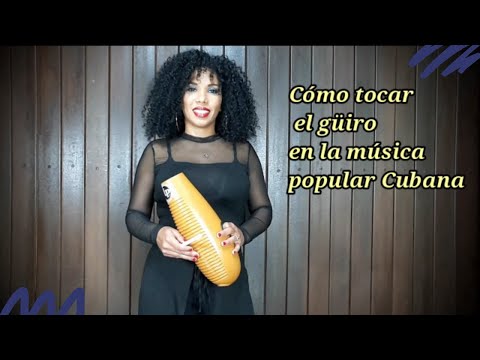 How to play the güiro in Cuban popular music.
