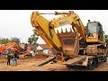 Loading Transporting The Broken Down Excavator Komatsu PC300 By Self Loader Truck Isuzu Giga FVZ 285