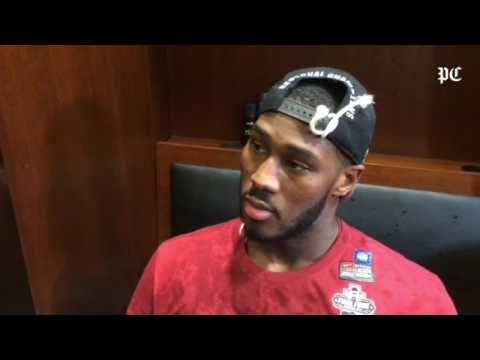 Gamecocks guard Justin McKie on embracing his father, USC career scoring leader BJ McKie, after Flor