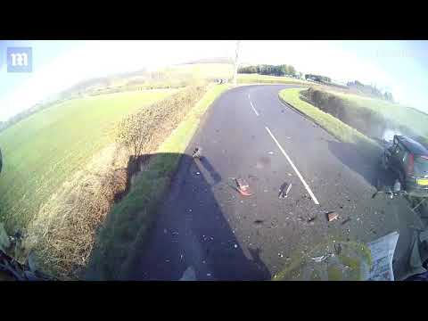 Terrifying moment car loses control and hits lorry head-on