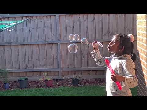 Jerusha Pearl blowing bubbles
