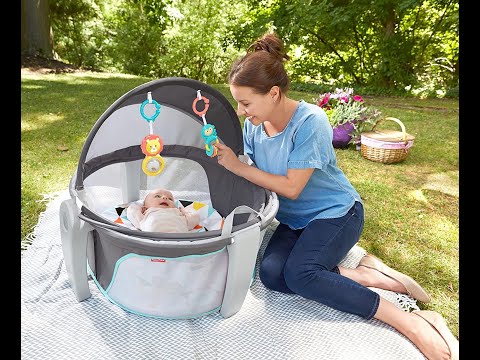 Portable Bassinet and Travel Play Area with Baby Toys