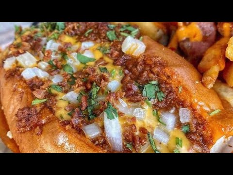 Chili dog with a lobster roll bacon wrapped  made chorizo chili onion melted cheese 🥓