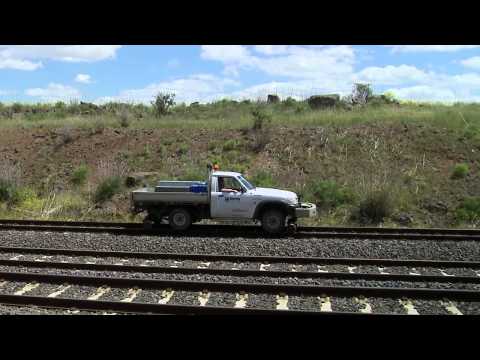 "High Rail" utility vehicle on train tracks near Little River, Victoria