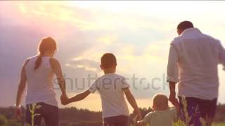 stock footage happy young family with two children walking on summer field healthy mother father and
