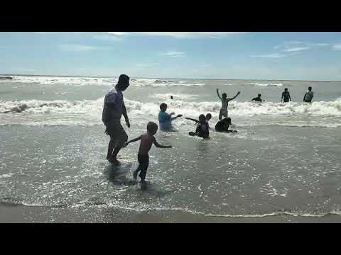 Jayan playing with papa at beach 