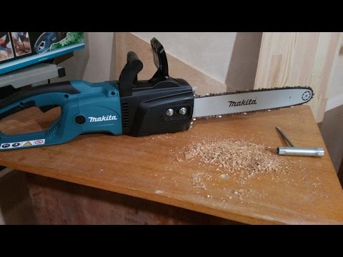 Elektrinis grandininis pjūklas Makita UC4050A video