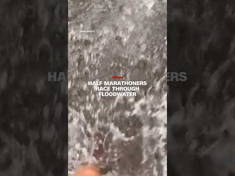 Half marathoners race through floodwater