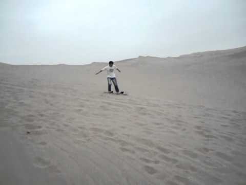surfeando en la arena