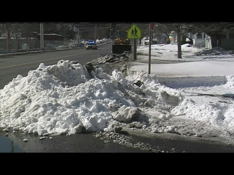 Snow banks being cleared ahead of St. Patrick’s Parade