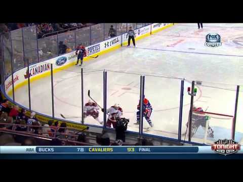 Mike Ribeiro bats in the goal for the Coyotes at Edmonton