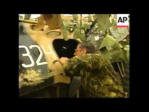 KOSOVO: PRISTINA: RUSSIAN SOLDIERS SECURE AIRPORT (V)