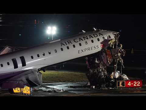 2 killed after Air Canada jet hits fire truck at LaGuardia Airport