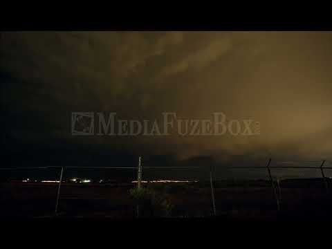 Stock Video - Timelapse of lightning storm moving on the horizon