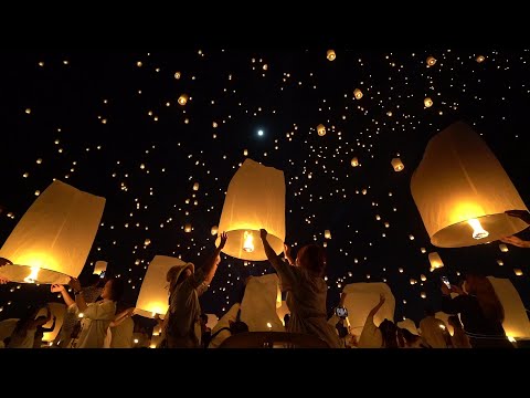 Thousands of lanterns light up Thailand's sky for full moon festival | AFP