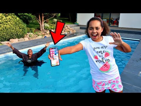 MY DAD'S iPhone X IN OUR SWIMMING POOL PRANK!!