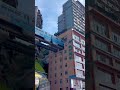 Chinese Metro Train Passing Through Residential Building In Chongqing